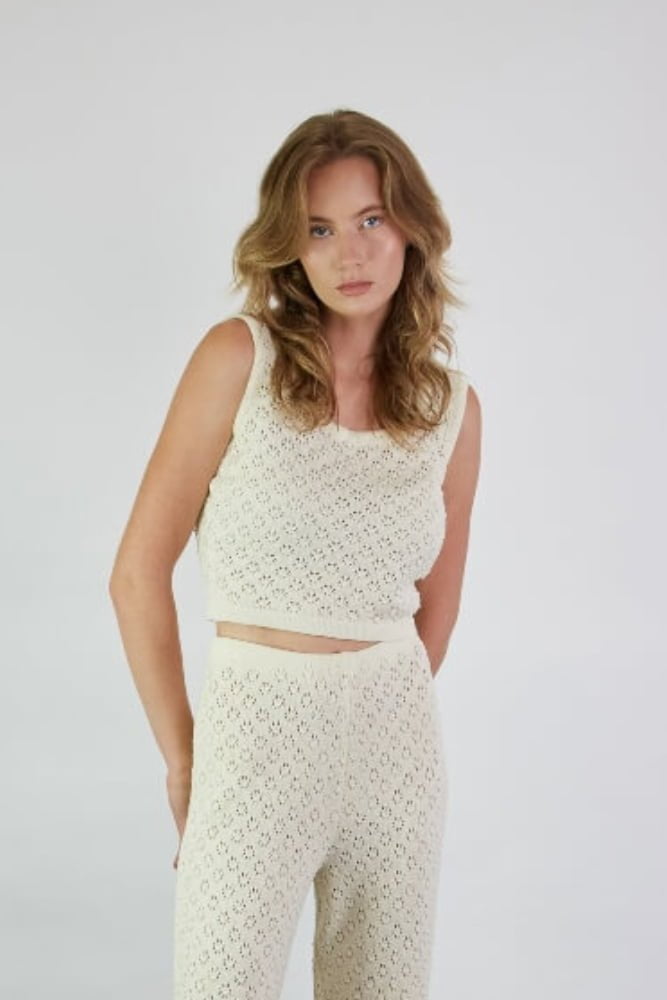 White merino wool crop top in a lace pattern. Ethically made in Lithuania