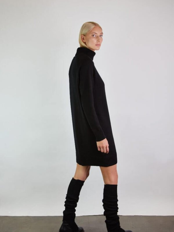 Merino wool dress with a roll neck and matching leg warmers with slits. Handmade by experience craters