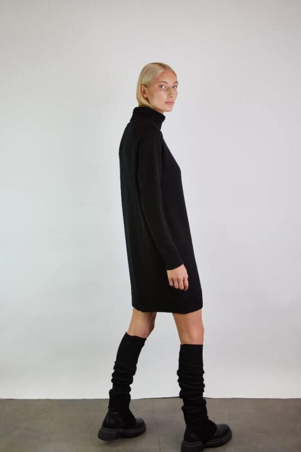 Merino wool dress with a roll neck and matching leg warmers with slits. Handmade by experience craters