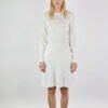 Feminine lace dress in merino wool. A-line skirt with a wavy hem