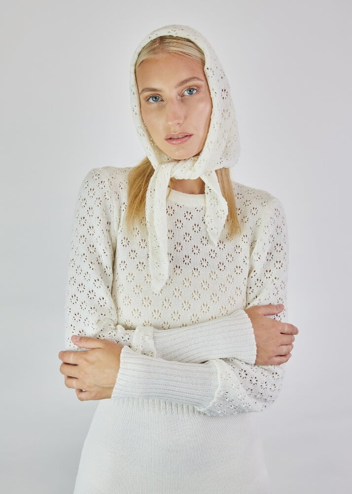 White merino wool dress with a lace top.