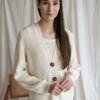 Natural white merino wool cardigan in the English rib