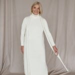 Natural white merino wool dress with a turtleneck and neck accessory