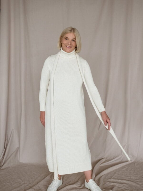 Natural white merino wool dress with a turtleneck and neck accessory