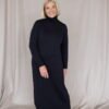 Relaxed fitting merino wool dress with a roll neck and a long ribbed hem