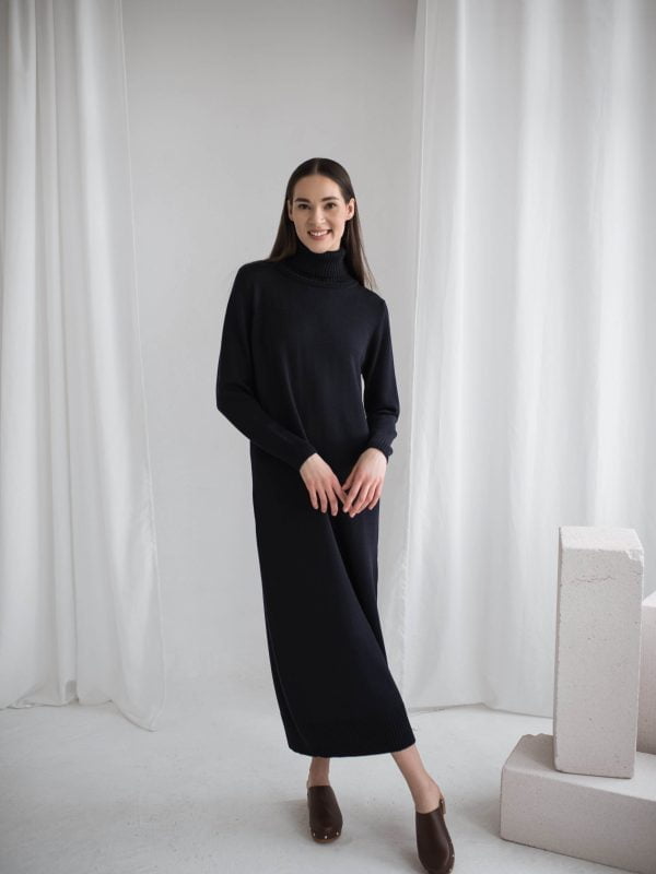 Black sweater dress in a minimalist silhouette