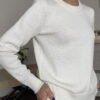 Regular fit merino wool cardigan in white. Crew neck, ribbed sleeve ends and hem.