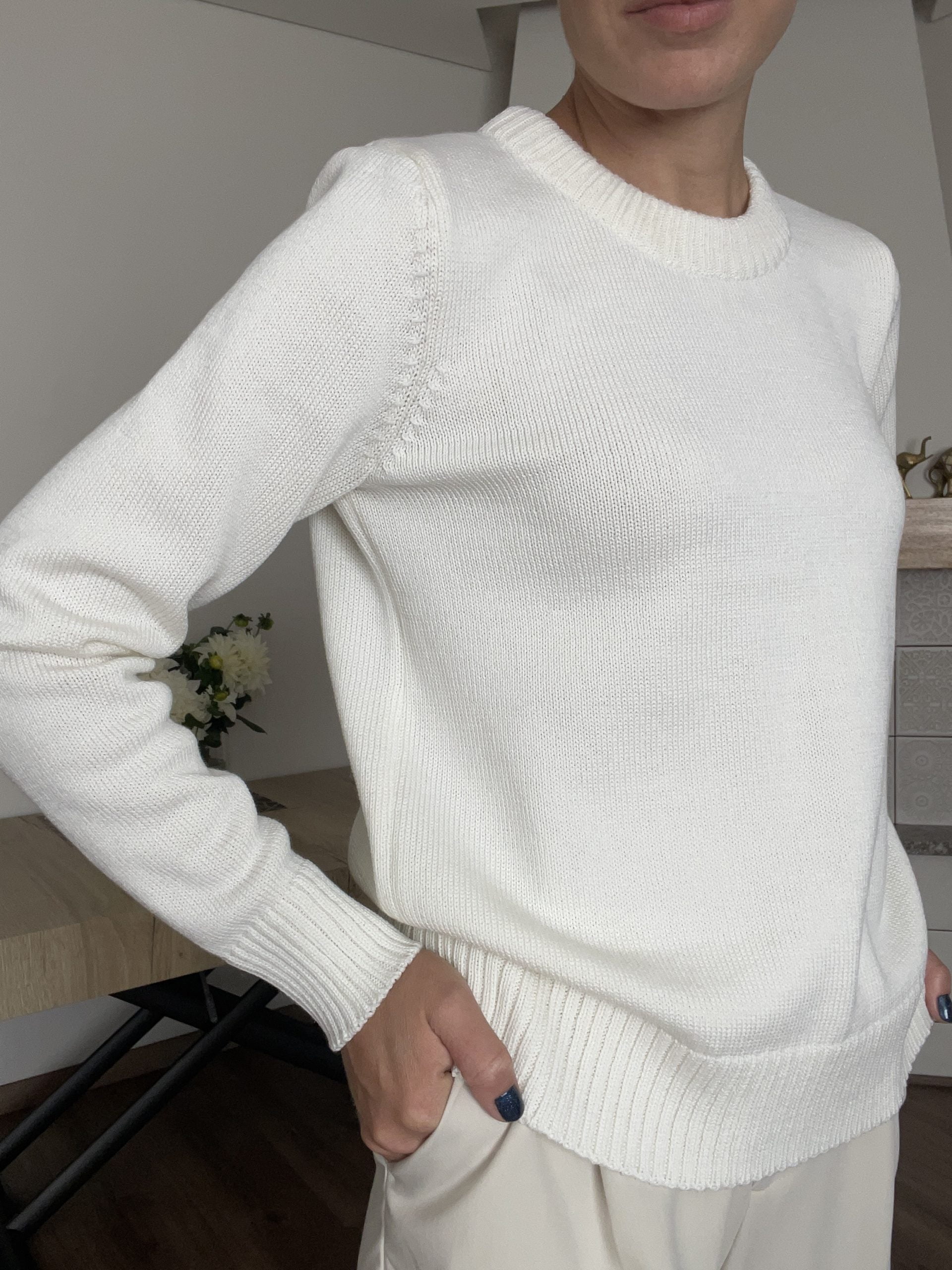 Regular fit merino wool cardigan in white. Crew neck, ribbed sleeve ends and hem.