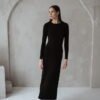 Minimalist merino wool dress with a side slit. Ideal for various occasions