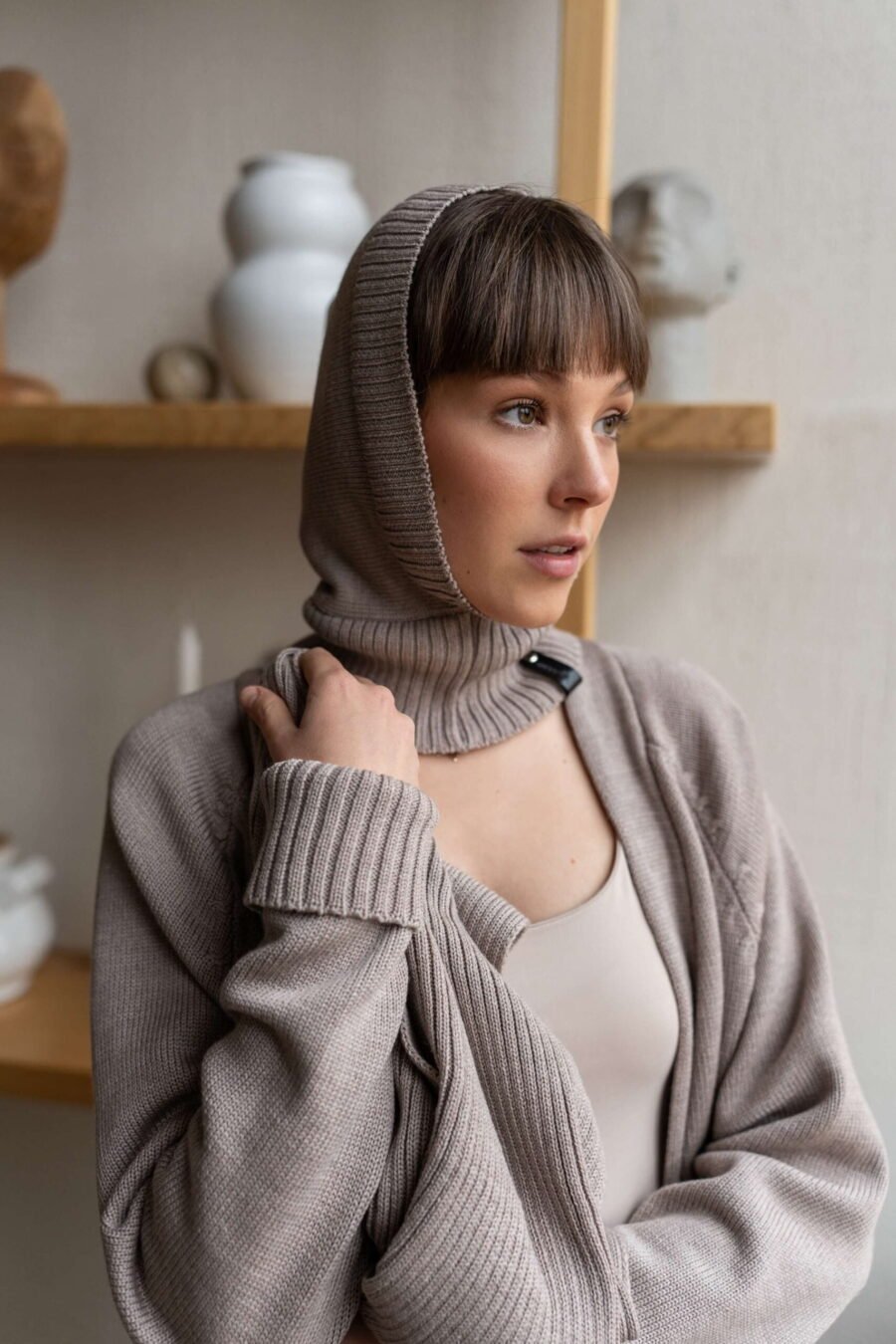 Elegant and practical knitted balaclava to keep you warm. Paired with a matching raglan sleeve cardigan.