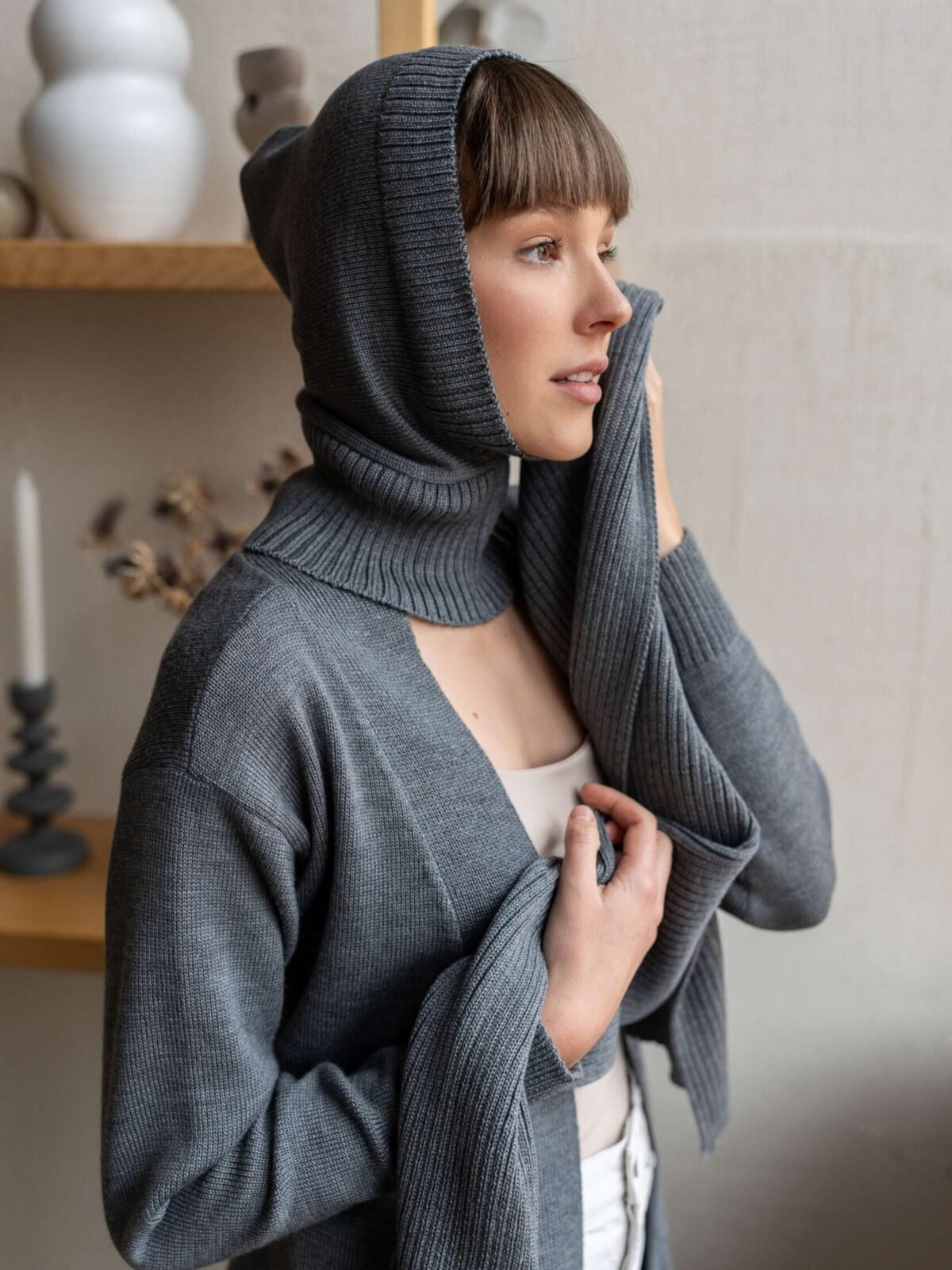 Grey knitted winder hood to protect ears and hair. Keep yourself toasty on those windy days!