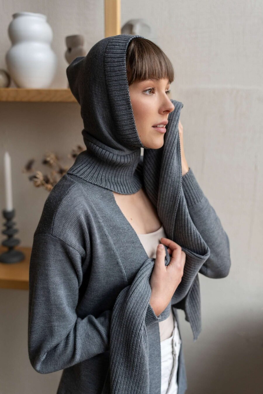 Grey knitted winder hood to protect ears and hair. Keep yourself toasty on those windy days!