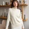 Classic merino wool sweater with ribbed trims.