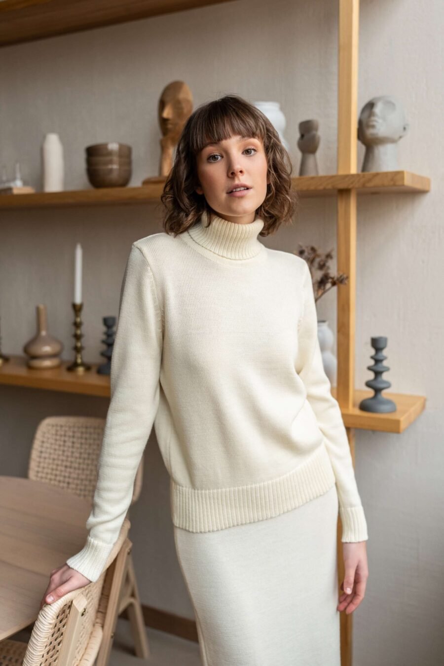 Classic merino wool sweater with ribbed trims.