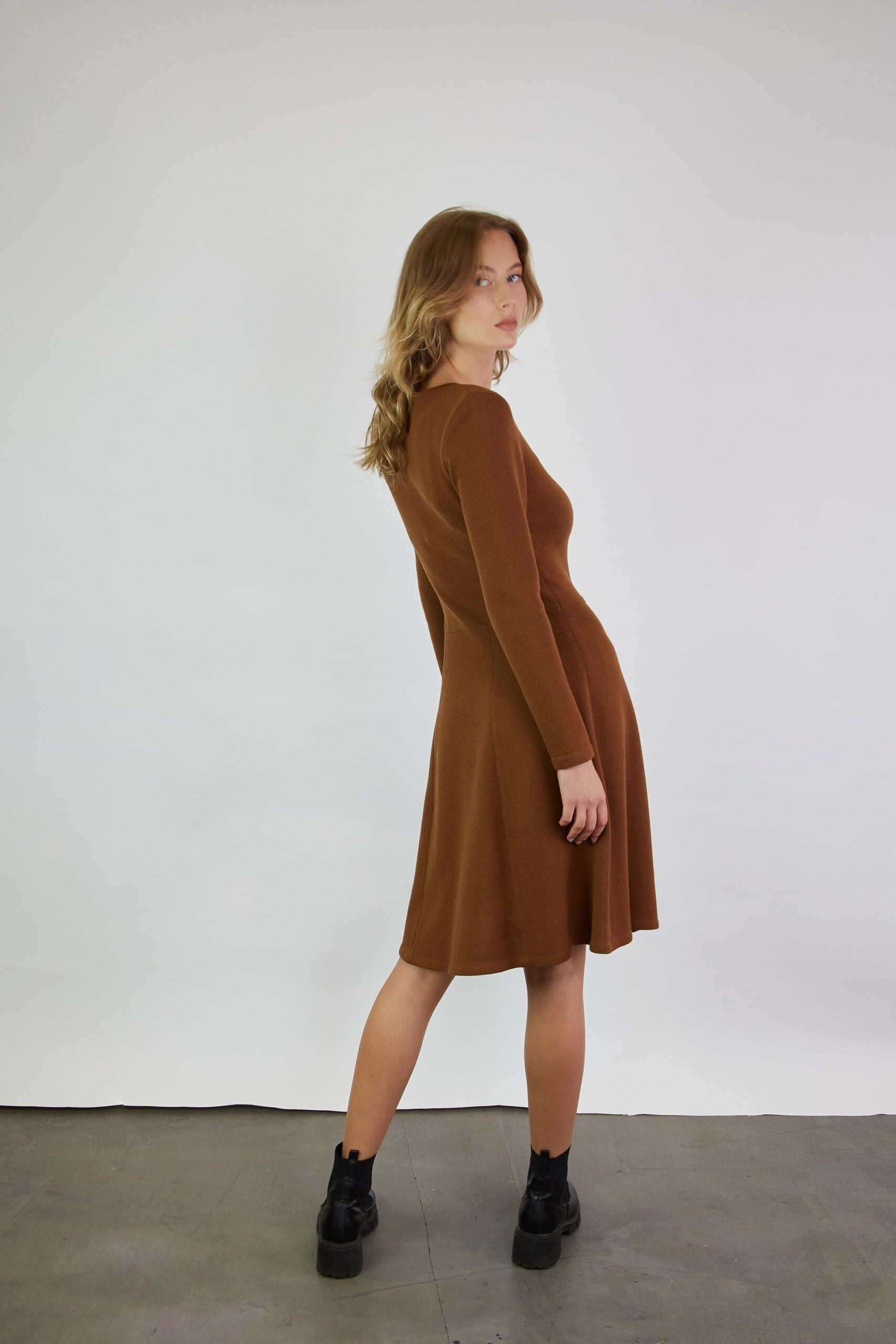 Knee-length merino wool dress with a half-circle skirt.