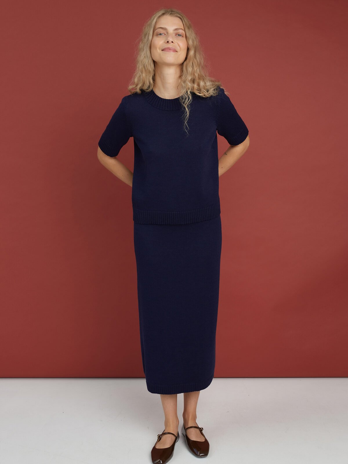 Minimalist merino wool knitted outfit with skirt